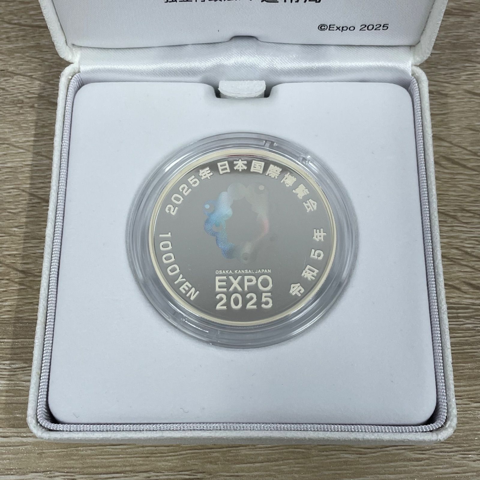 2025年日本国際博覧会記念千円銀貨幣（第一次発行） - メルカリ
