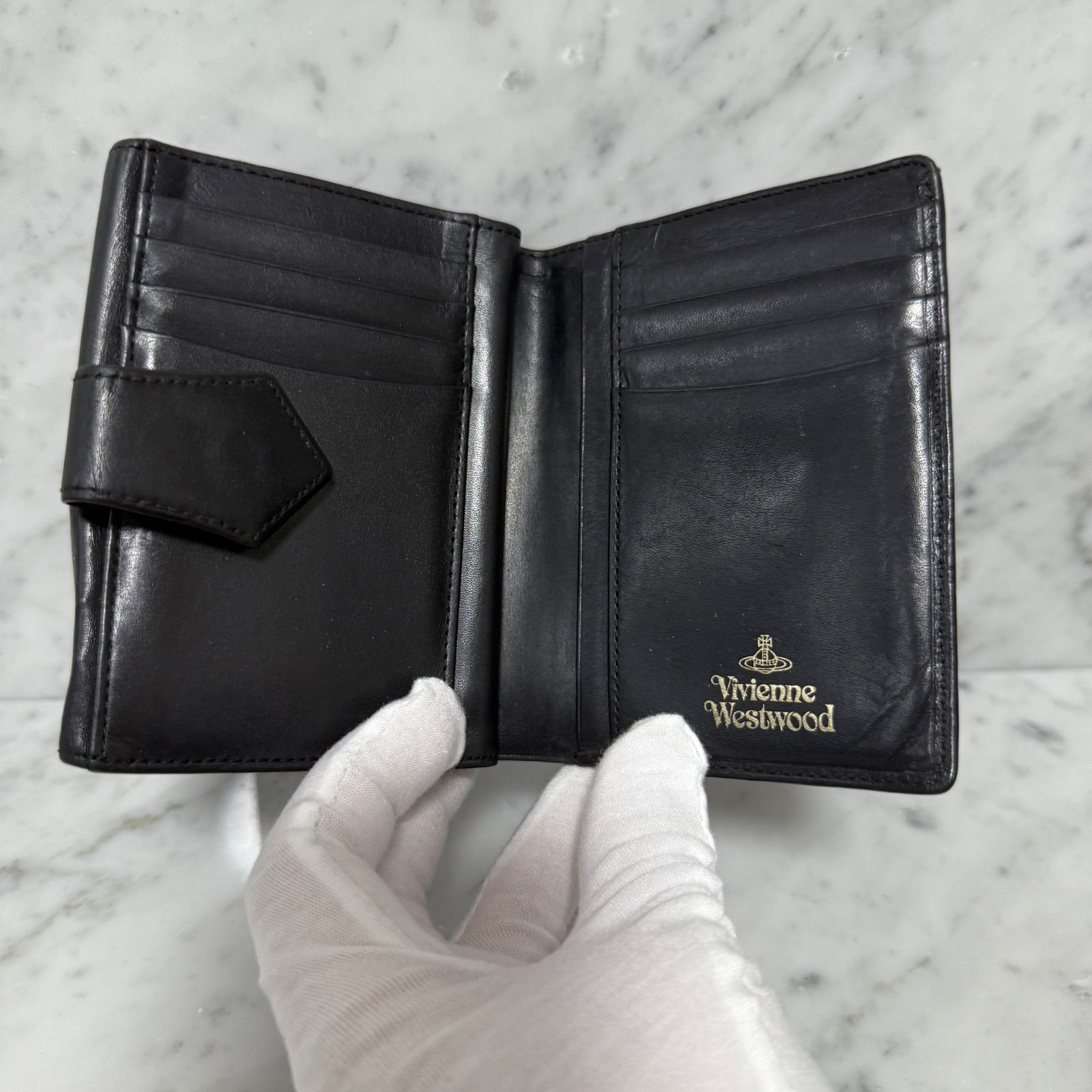 極美品✨ヴィヴィアンウエストウッド ニつ折財布 シボ革 シルバーロゴ