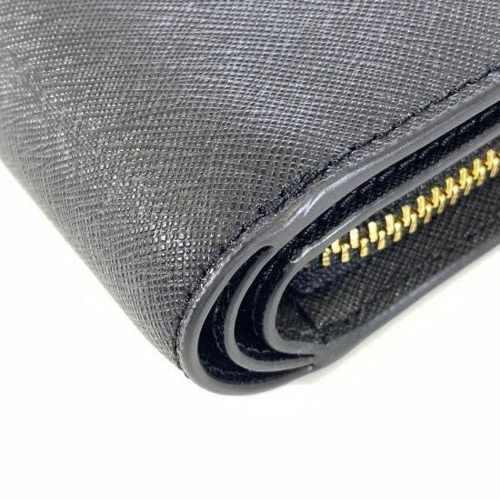 トリーバーチ レザー ジップ 二つ折り財布 ブラック - メルカリ 