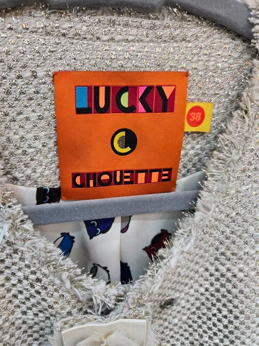 LUCKY CHOUETTE ツイード チェーン 装飾 ジャケット