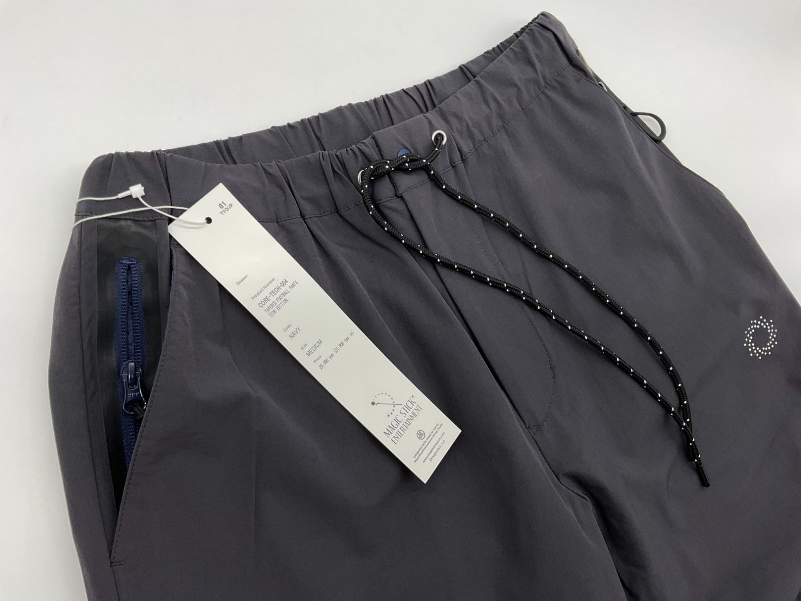 サイズL【新品】MAGIC STICK テーパードフットボールパンツ 新品 M MAGIC STICK マジックスティック テーパードフットボール