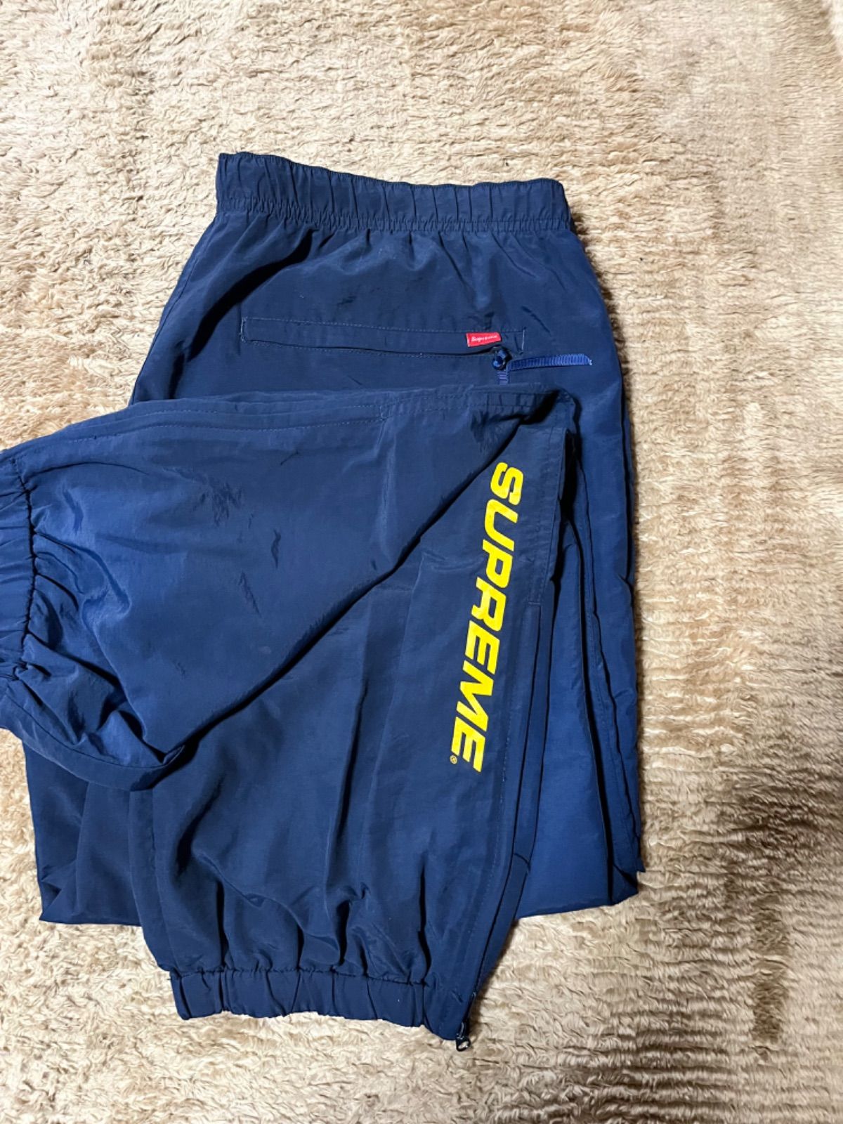 SUPREME WARM UP PANT NAVY L