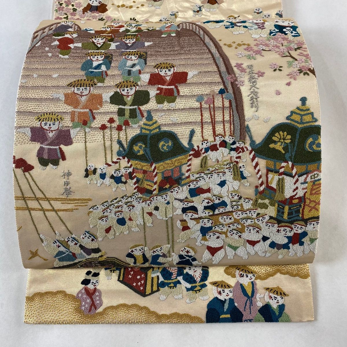 袋帯 日本の祭 祭りの風景 人物 相良刺繍 箔 金色 お太鼓柄 正絹