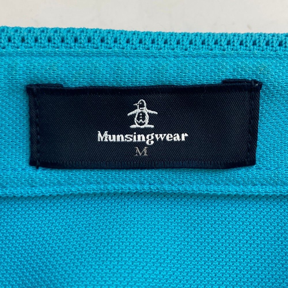 サイズ：M MUNSING WEAR マンシングウェア 2023年モデル ハーフジップ 半袖ポロシャツ  ブルー系 [240101442116] ゴルフウェア メンズ ストスト サイズ：M MUNSING WEAR マンシングウェア 2023年モデル ハーフ