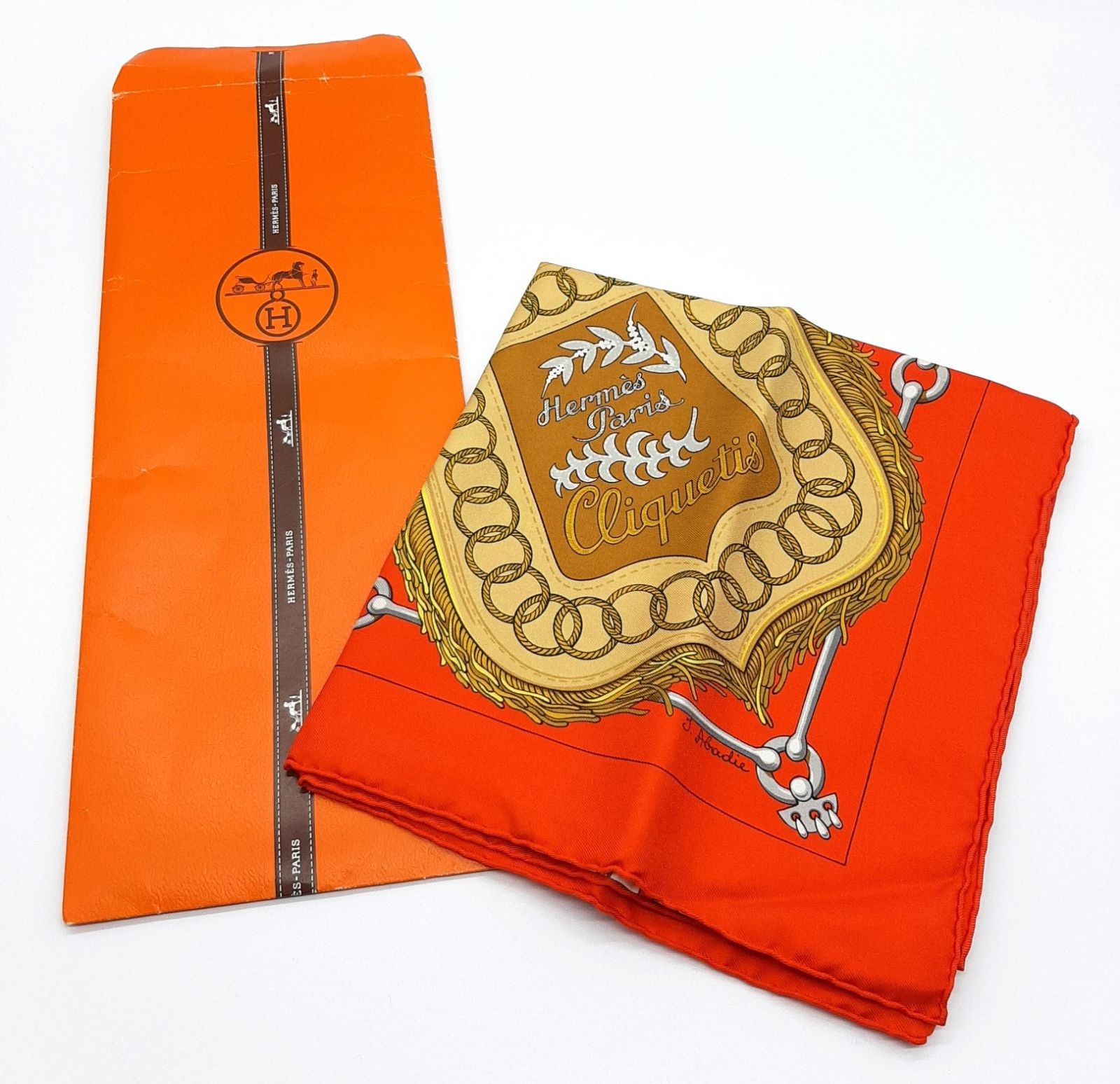 エルメス Hermès 未使用品 カレ 90 シルクスカーフ CLIQUETIS 赤系 袋