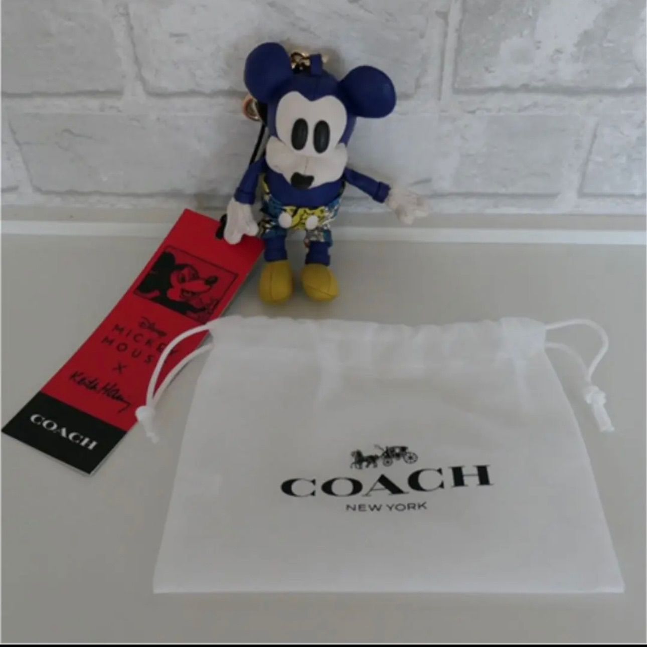 完売品！新品【COACH ×キースヘリング】 ミッキーマウス★バックチャームスポーツブルーマルチ