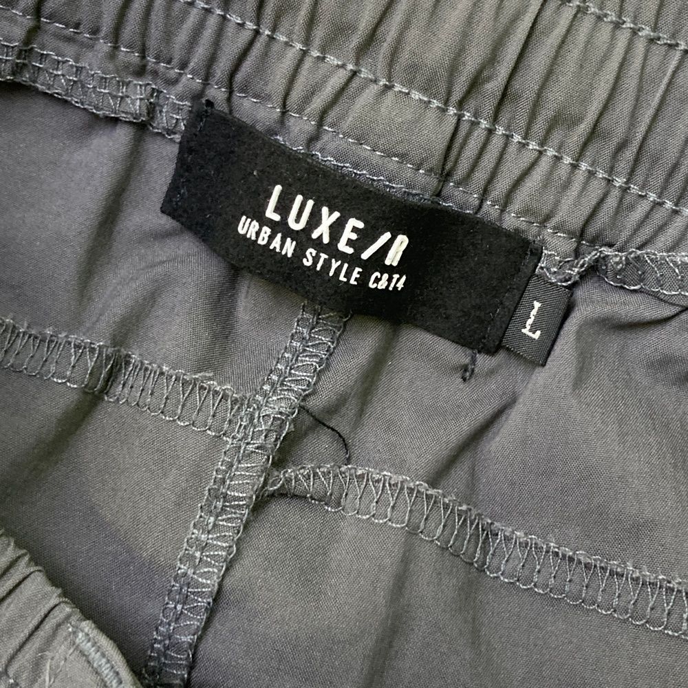 サイズ：L LUXE/R ラグジュ  ストレッチ ジョガーパンツ  グレー系 [240101487738] ゴルフウェア メンズ ストスト サイズ：L LUXE/R ラグジュ ストレッチ ジョガーパンツ グレー系