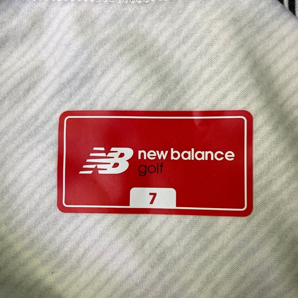 サイズ：7 NEW BALANCE GOLF ニューバランス  裏起毛 ハイネック 長袖Tシャツ ロゴ総柄 ホワイト系 [240101435177] ゴルフウェア メンズ ストスト サイズ：7 NEW BALANCE GOLF ニューバランス 裏起毛 ハイネック