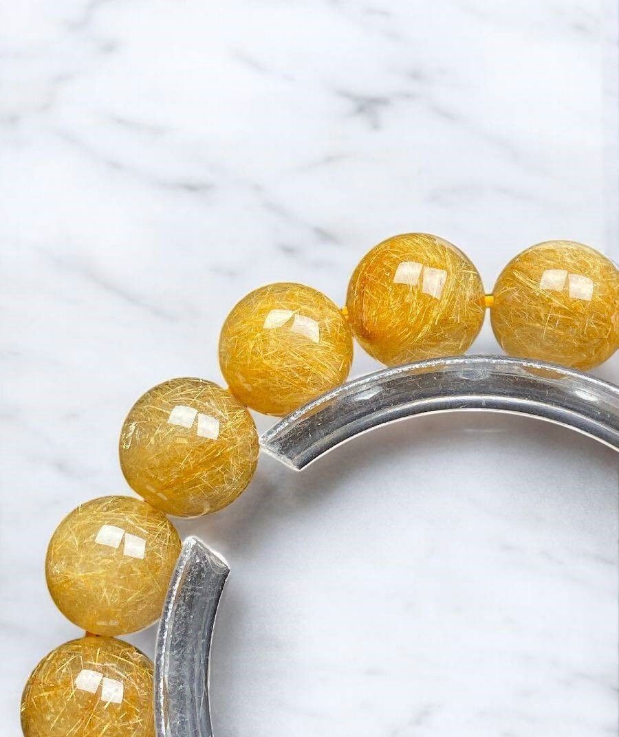 nep7j5]ゴールドタイチンルチル 12.5mm 極品位 式神封入 - メルカリ 