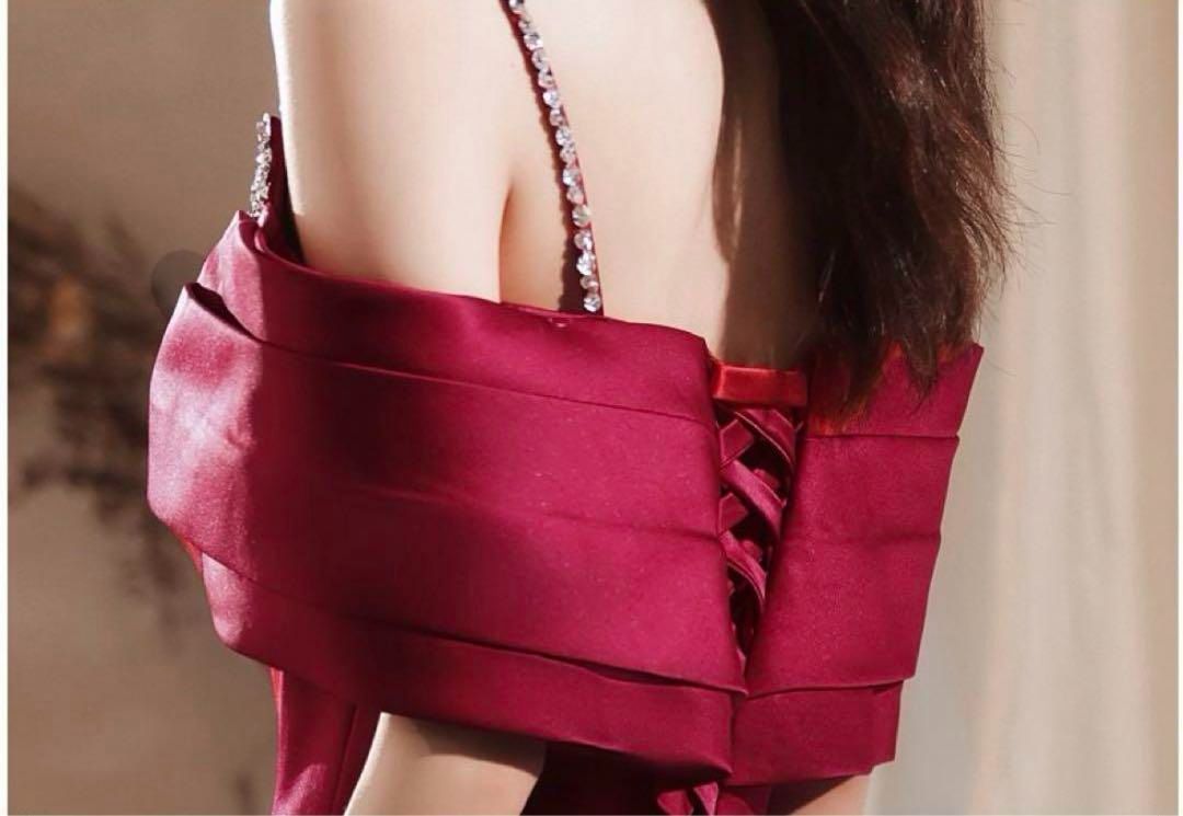 リボンのデザインが可愛くゴージャスオフショルイブニングドレス