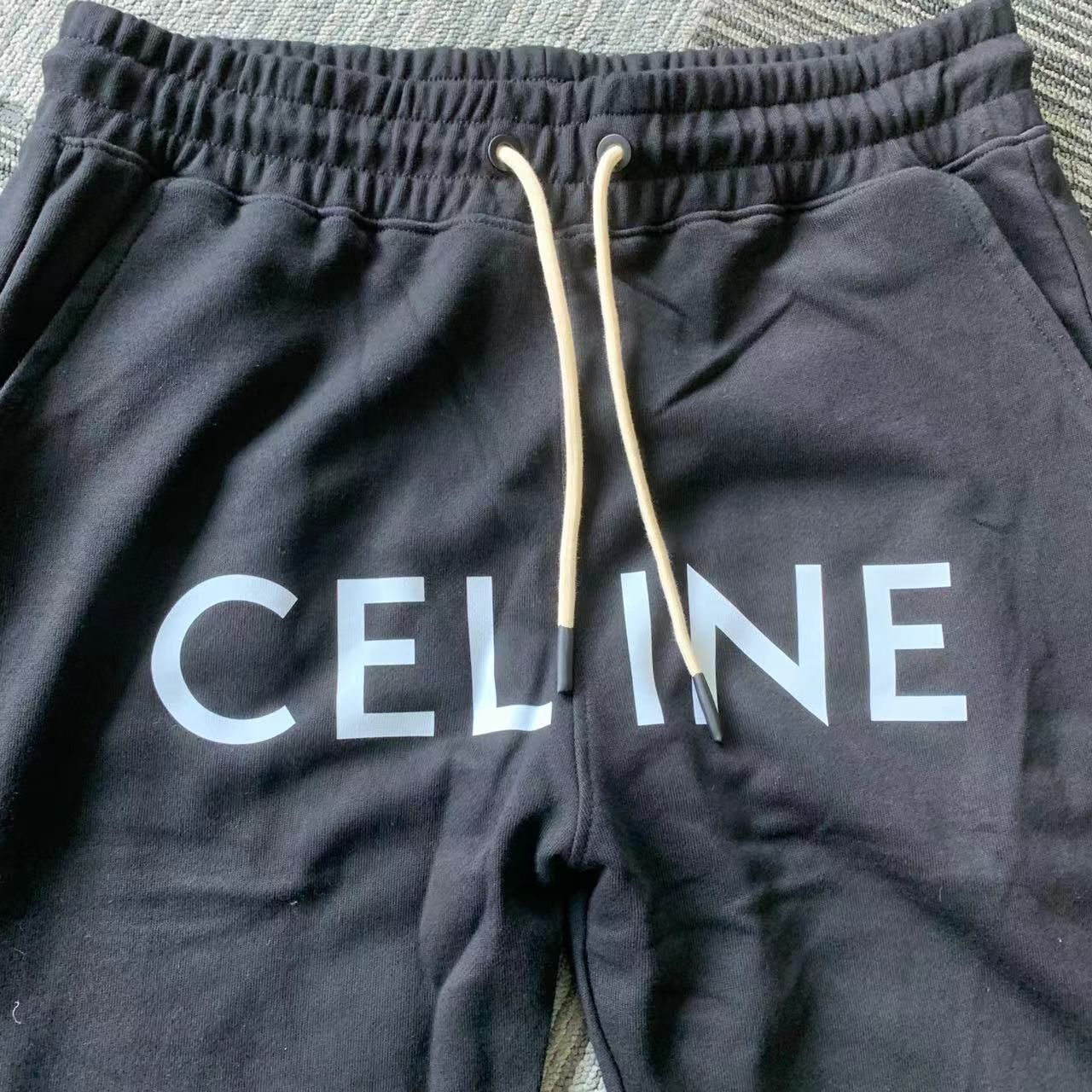 新品 CELINE セリーヌ ホワイトロゴ スウェットパンツ男女兼用 - メルカリ