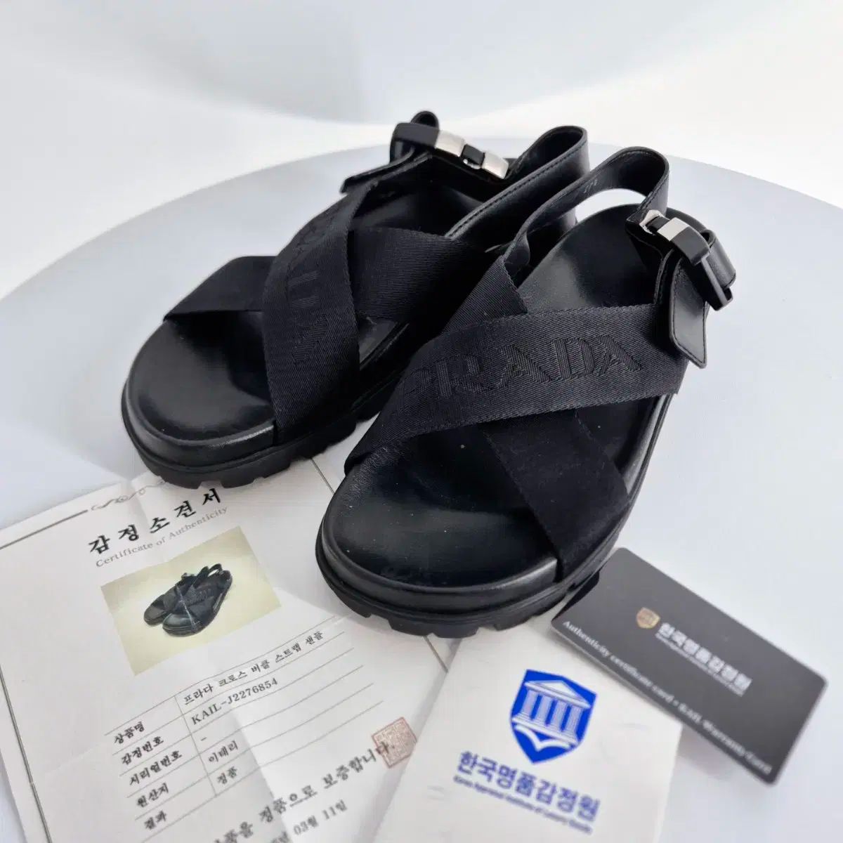 37 5 サイズ PRADA(プラダ) クロス バックル ストラップ レディース 