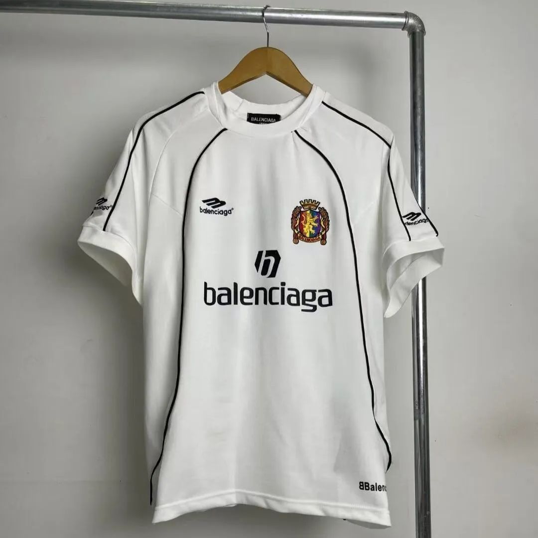 マンチェスター・ユナイテッドの連名のサッカーの刺繡のユニフォームのプリントの新型はゆったりとした半袖のTシャツの男女は同款です