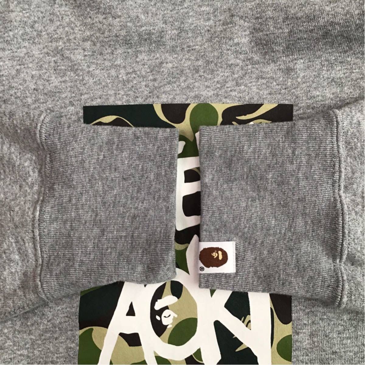 AAPE steve aoki コラボ パーカー BAPE × STEVE AOKI ☆4店舗限定☆ プルオーバーパーカー - メルカリ
