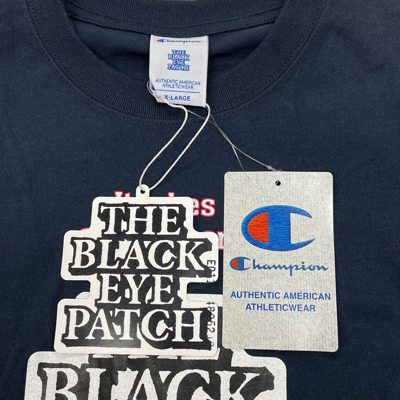 新品 Champion BLACK EYE PATCH ショートスリーブ コラボ プリント 