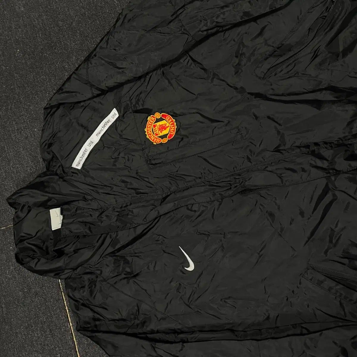 Nike マンチェスター・ユナイテッド ウィンドブレーカー Nike マンチェスター・ユナイテッド ウィンドブレーカー