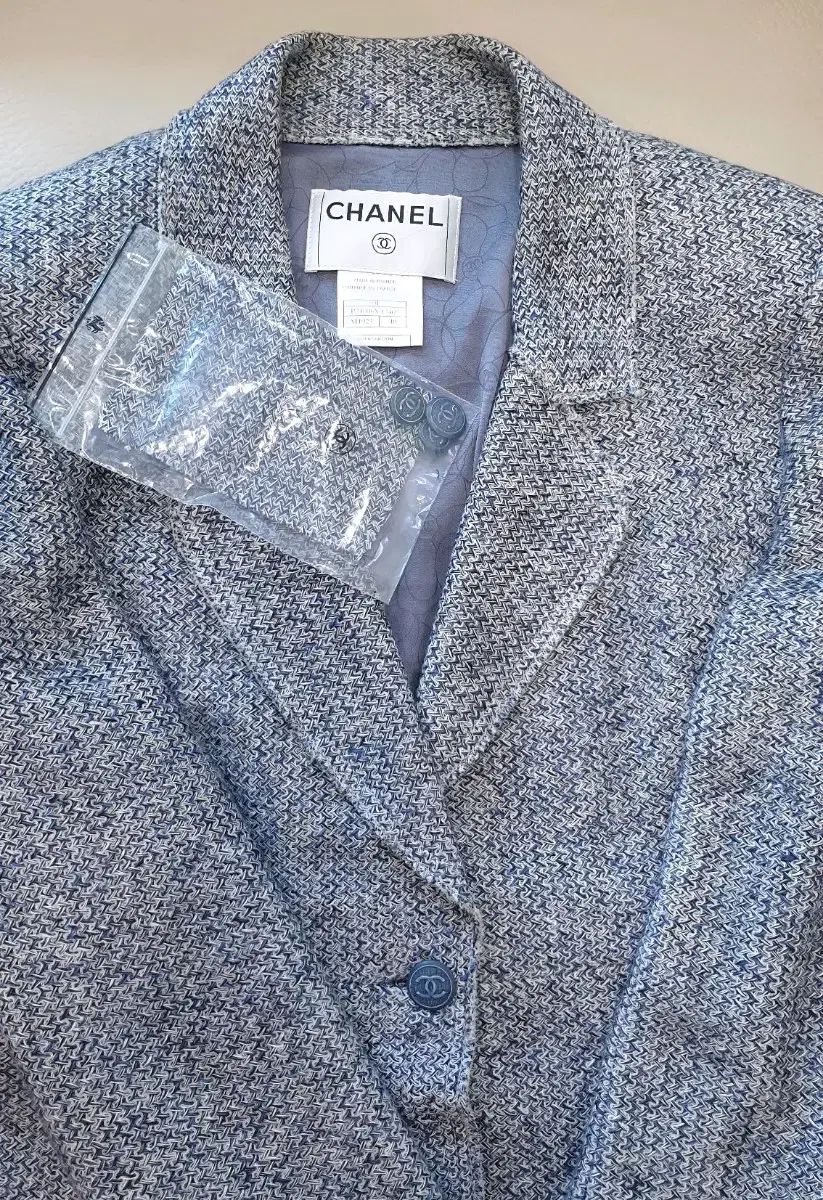 CHANELツイードジャケット  サイズ３８ シャネル ツイード ノーカラー ジャケット 38 ココマーク