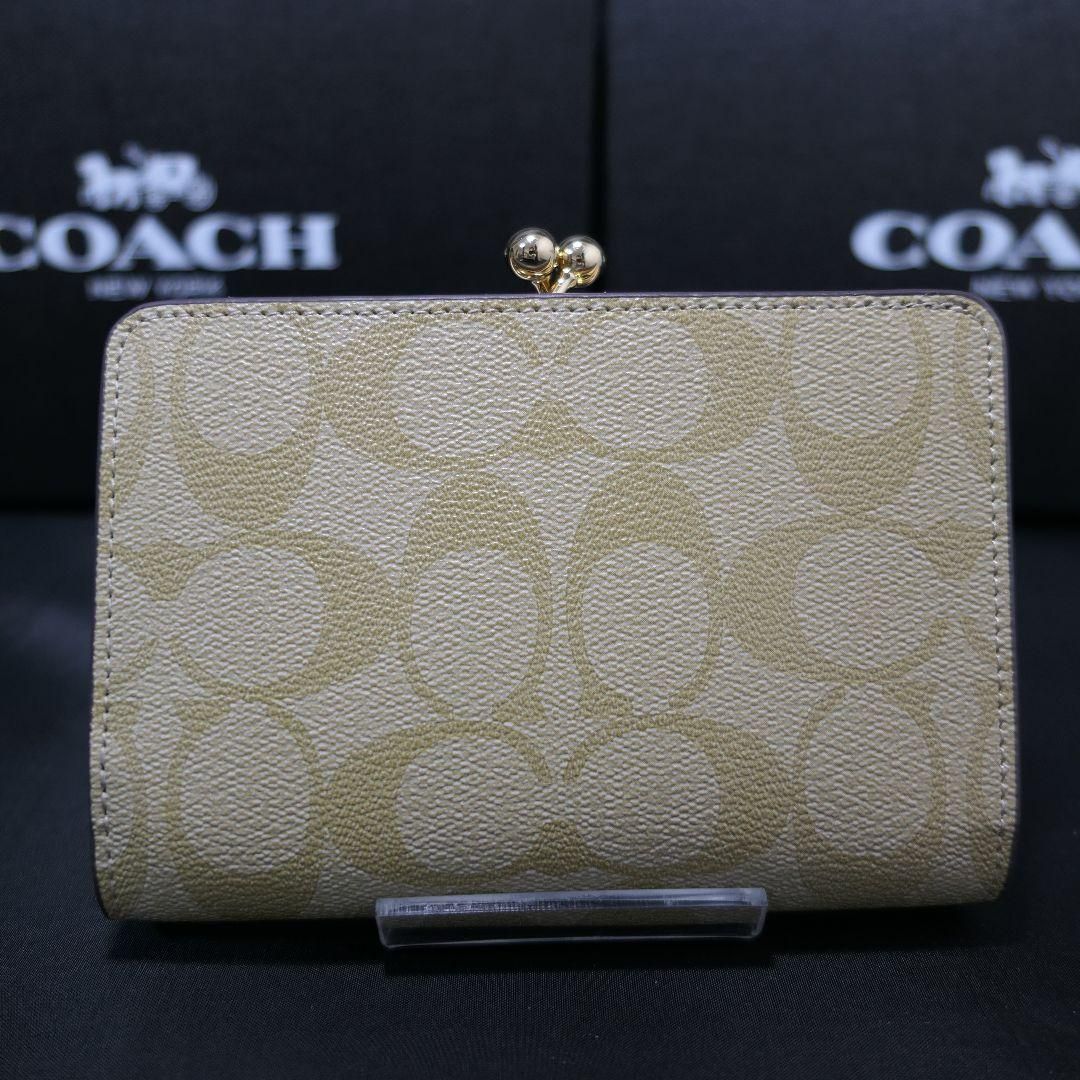 新品 COACH コーチ 二つ折り財布　シグネチャー　がま口　キスロック