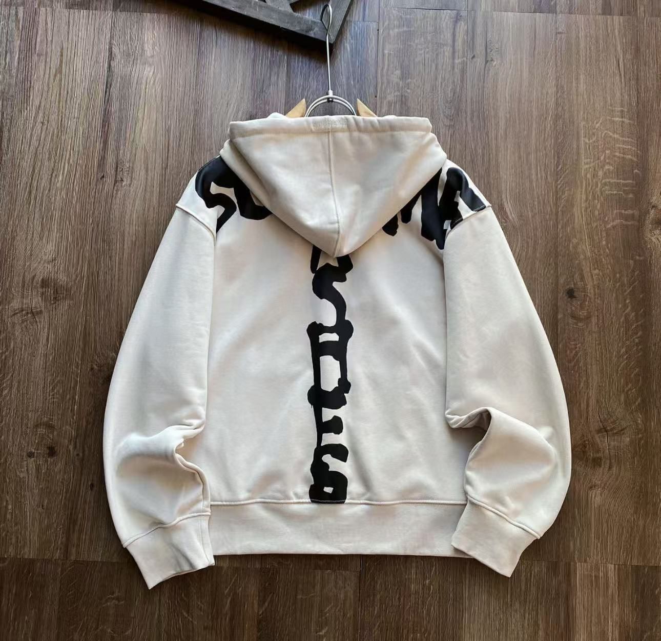 Supreme x thrasherベージュ フード付きパーカー - メルカリ