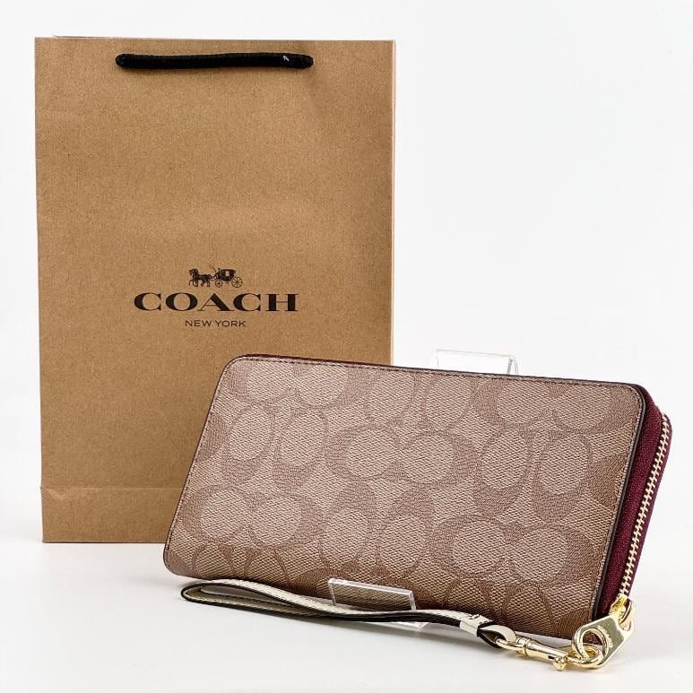 COACH x スヌーピー ☆ストラップ 付き 長財布 ☆PEANUTS - メルカリ