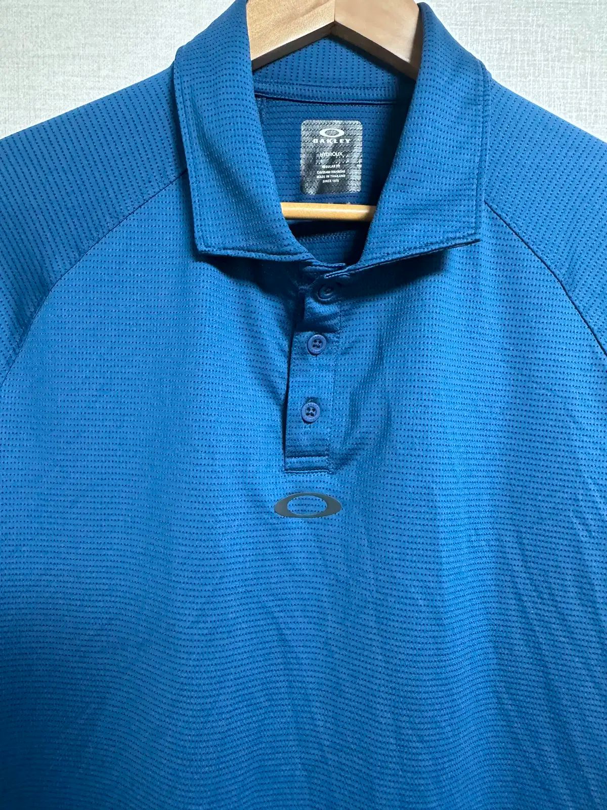 ヴィンテージ OAKLEY(オークリー) ポロTシャツ 半袖 青 L