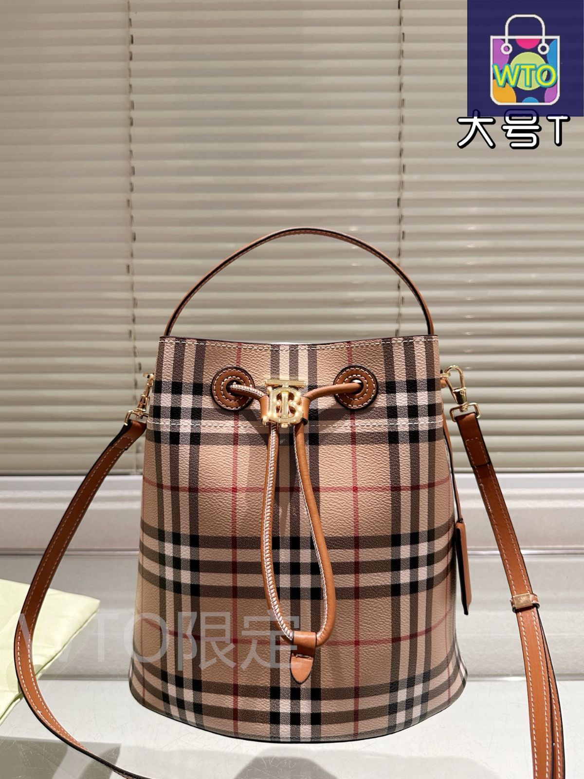【関税込み】Burberry ブラウン スモール TB バケットバッグ 三越伊勢丹 | burberry/バーバリー通販 | スモール TBバケット