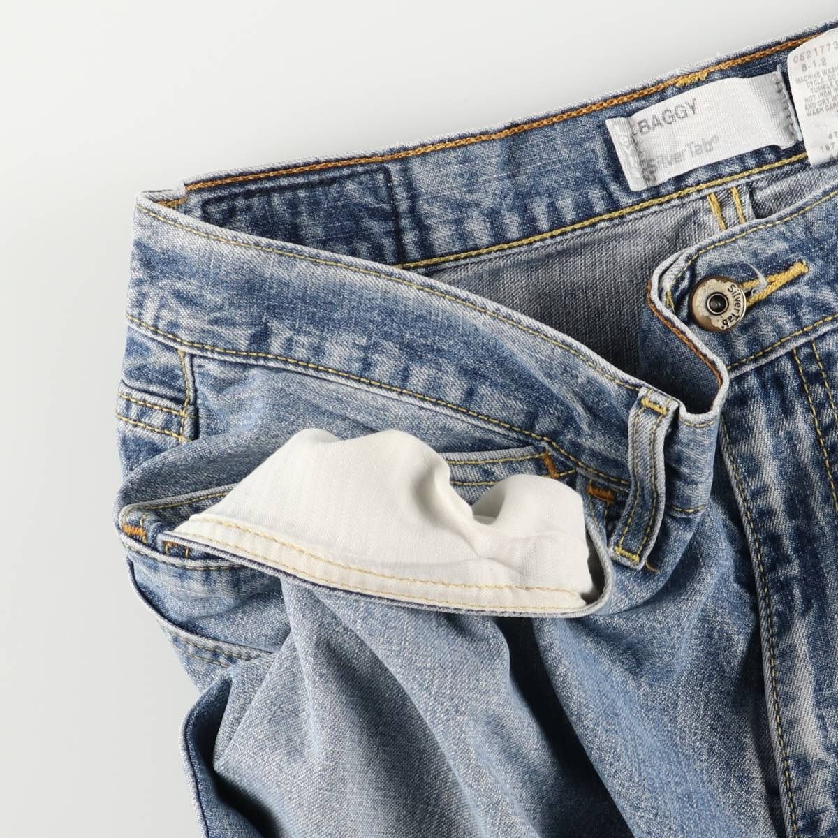 テーパードデニムパンツ