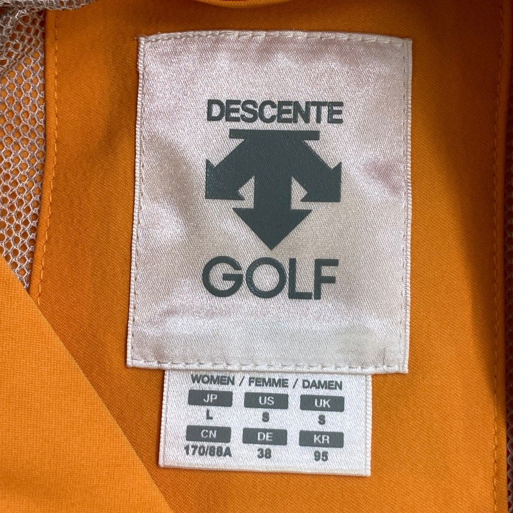 サイズ：L DESCENTE GOLF デサントゴルフ  メッシュ裏地付 長袖ジップジャケット  オレンジ系 [240101465953] ゴルフウェア レディース ストスト サイズ：L DESCENTE GOLF デサントゴルフ メッシュ裏地付 長袖