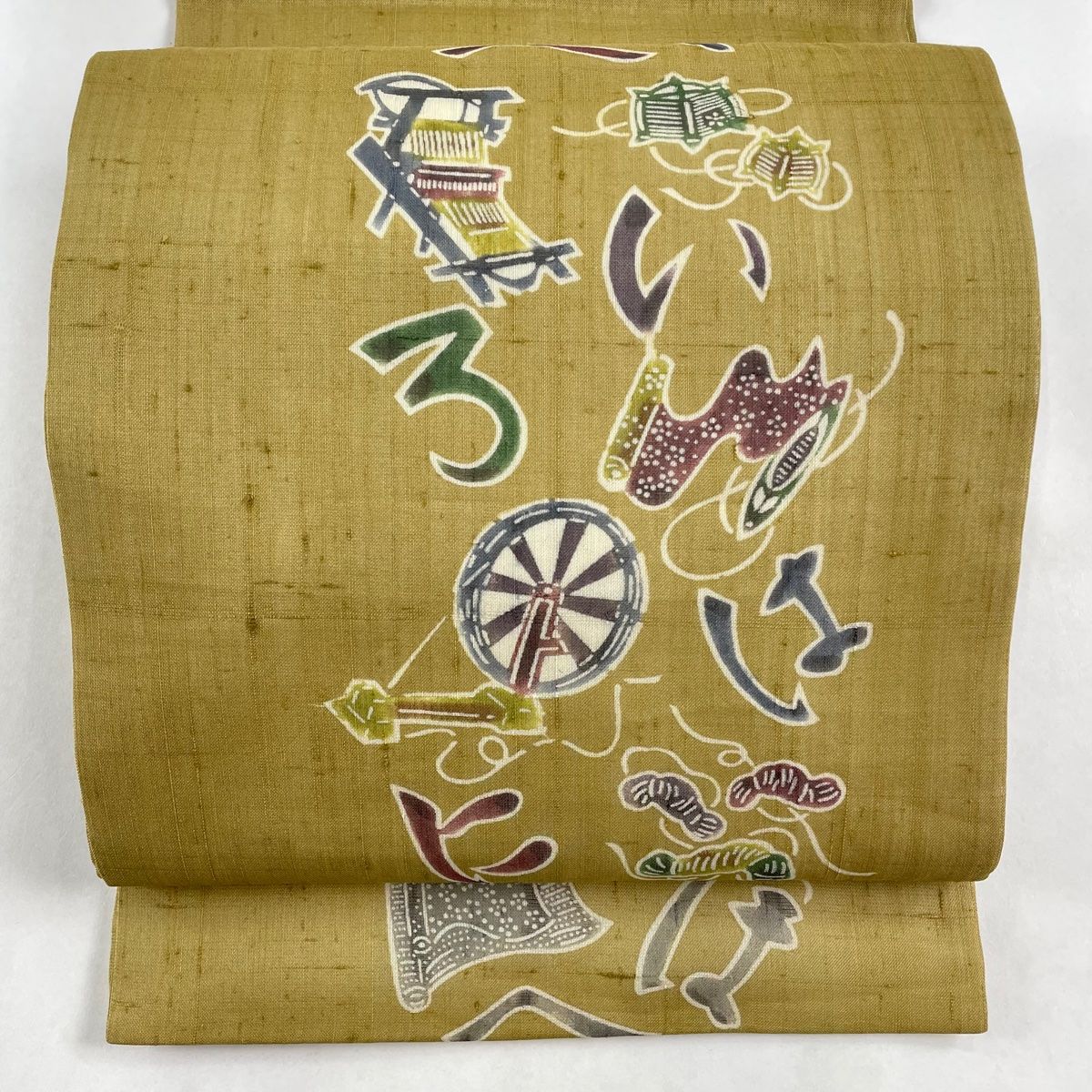 開き名古屋帯 秀品 夏帯 糸巻き 文字文 黄土色 正絹