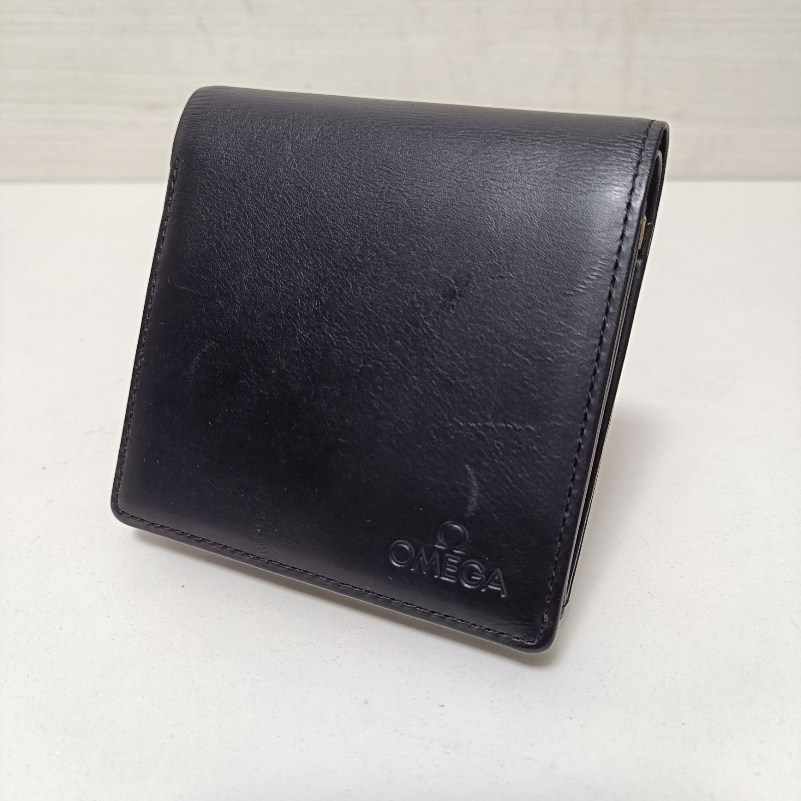オメガ 本革レザー 二つ折り財布 ブラック 美品 - メルカリ