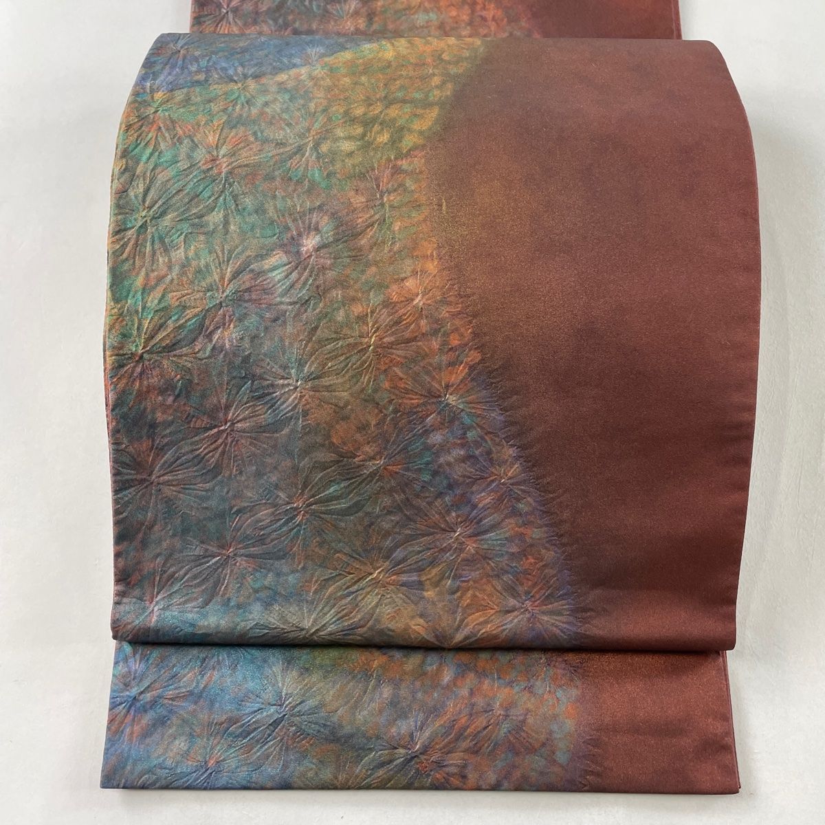 袋帯 美品 名品 証紙 大島紬地 幾何学模様 絞り 赤茶 全通 正絹 【中古