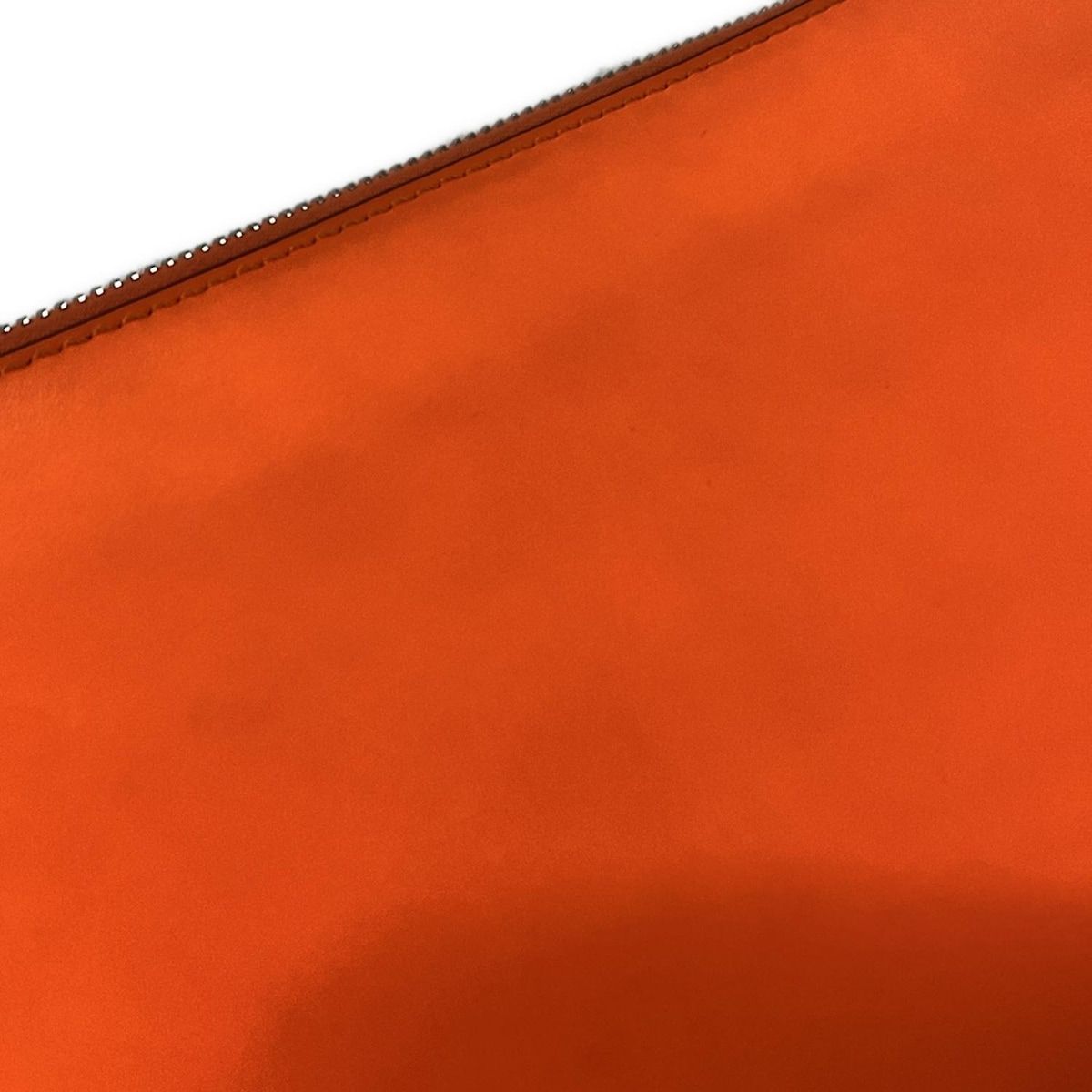 クラッチバッグ オレンジ
