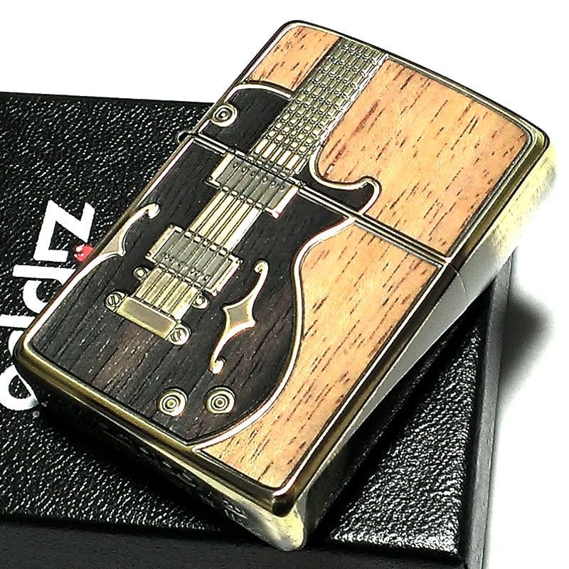 オシャレなギターの付いたZIPPOです。値下げました。 ZIPPO ライター アンテーク ギター ジッポ アンテークブラス