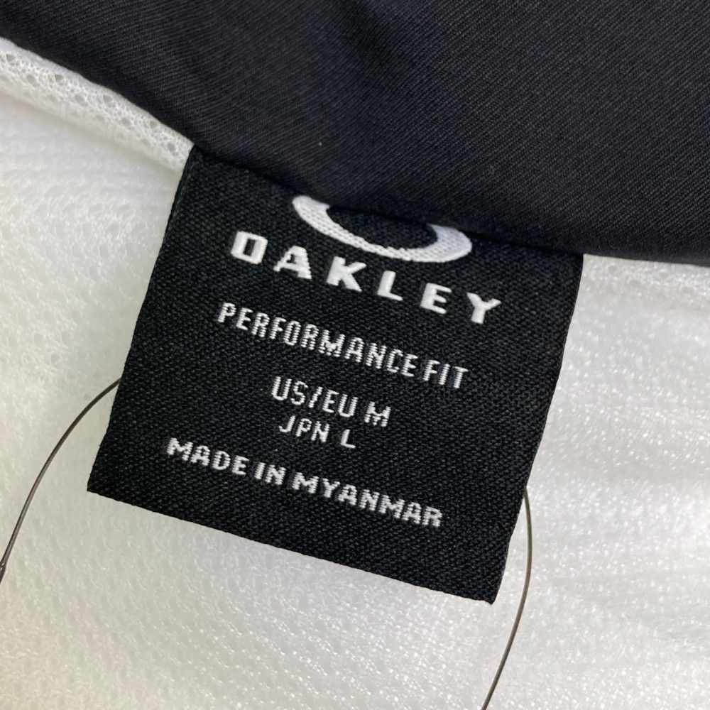 サイズ：L OAKLEY オークリー FOA406887 ジップジャケット  ホワイト系 [240101460578] ゴルフウェア メンズ ストスト OAKLEY オークリー ウィンドブレーカー メンズ ENHANCE WIND