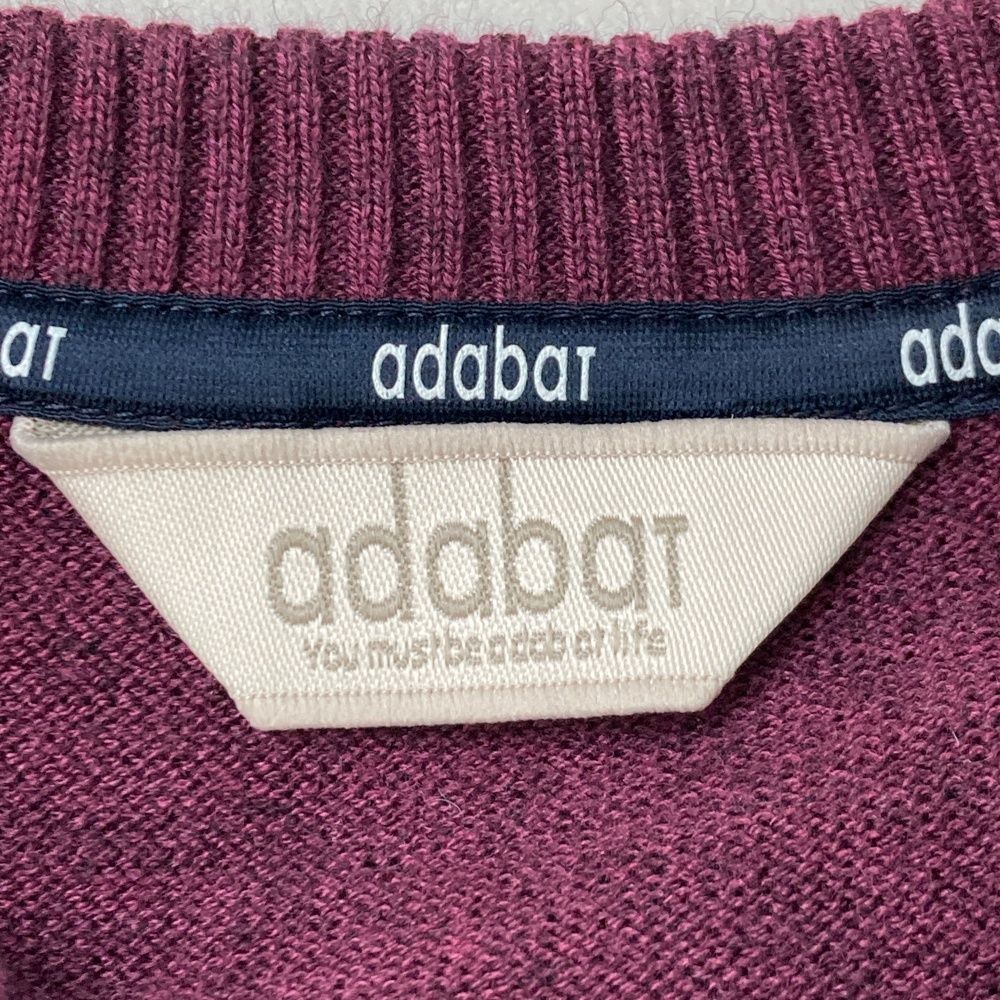 サイズ：48 ADABAT アダバット  ニットセーター  パープル系 [240101492430] ゴルフウェア メンズ ストスト サイズ：48 ADABAT アダバット ニットセーター パープル系