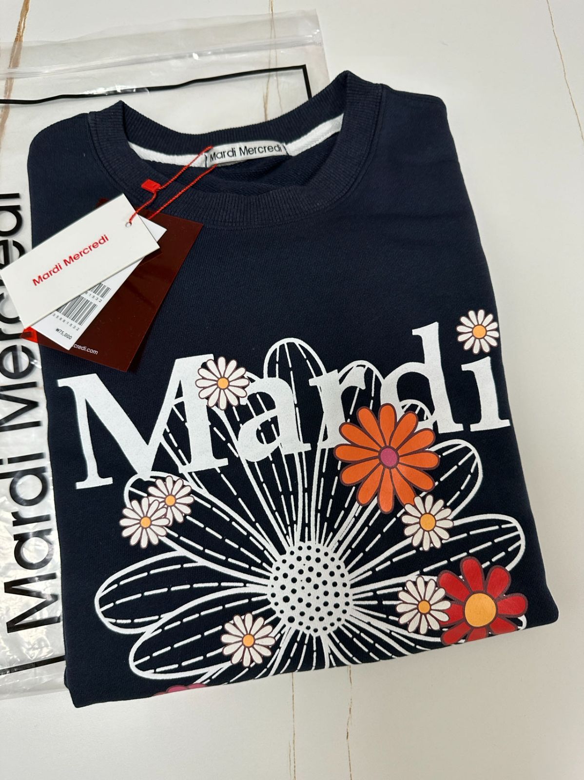 Mardi Mercredi マルディメクルディパーカー菊のロゴアイボリー