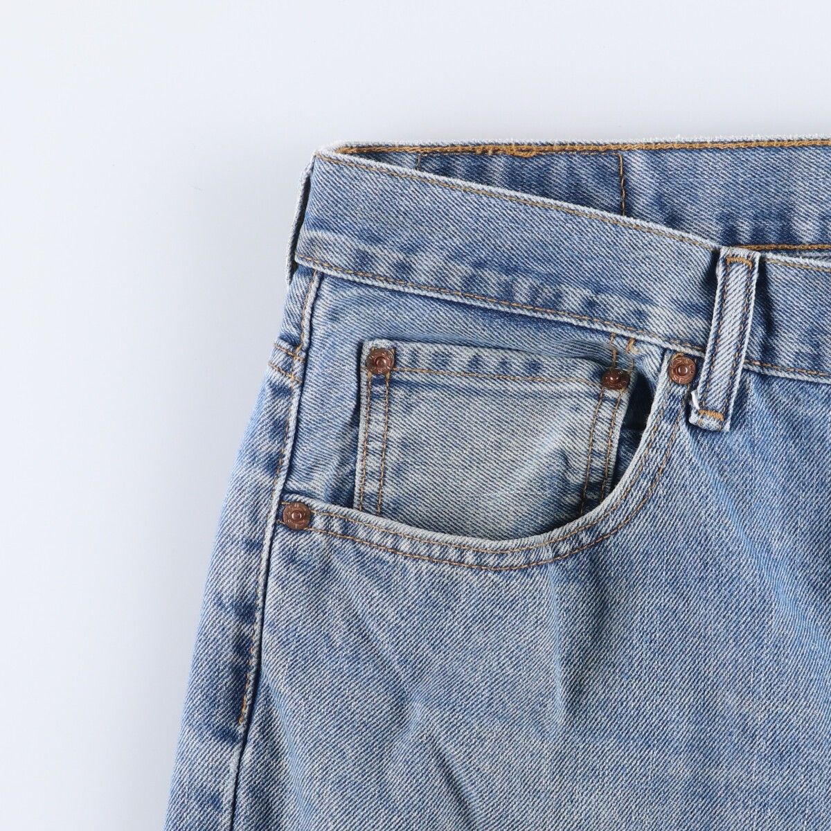 550 テーパードデニムパンツ