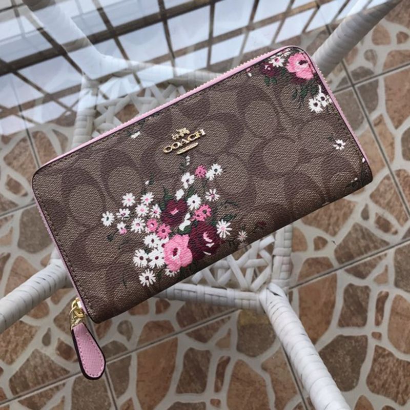 COACH 長財布 白系シグネチャー青い大きな花柄-