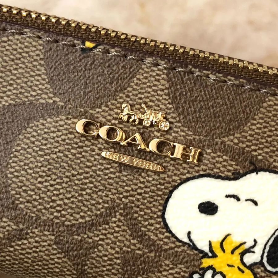 COACH コーチ × PEANUTS ピーナッツ SNOOPY ペンケース ブラウン系