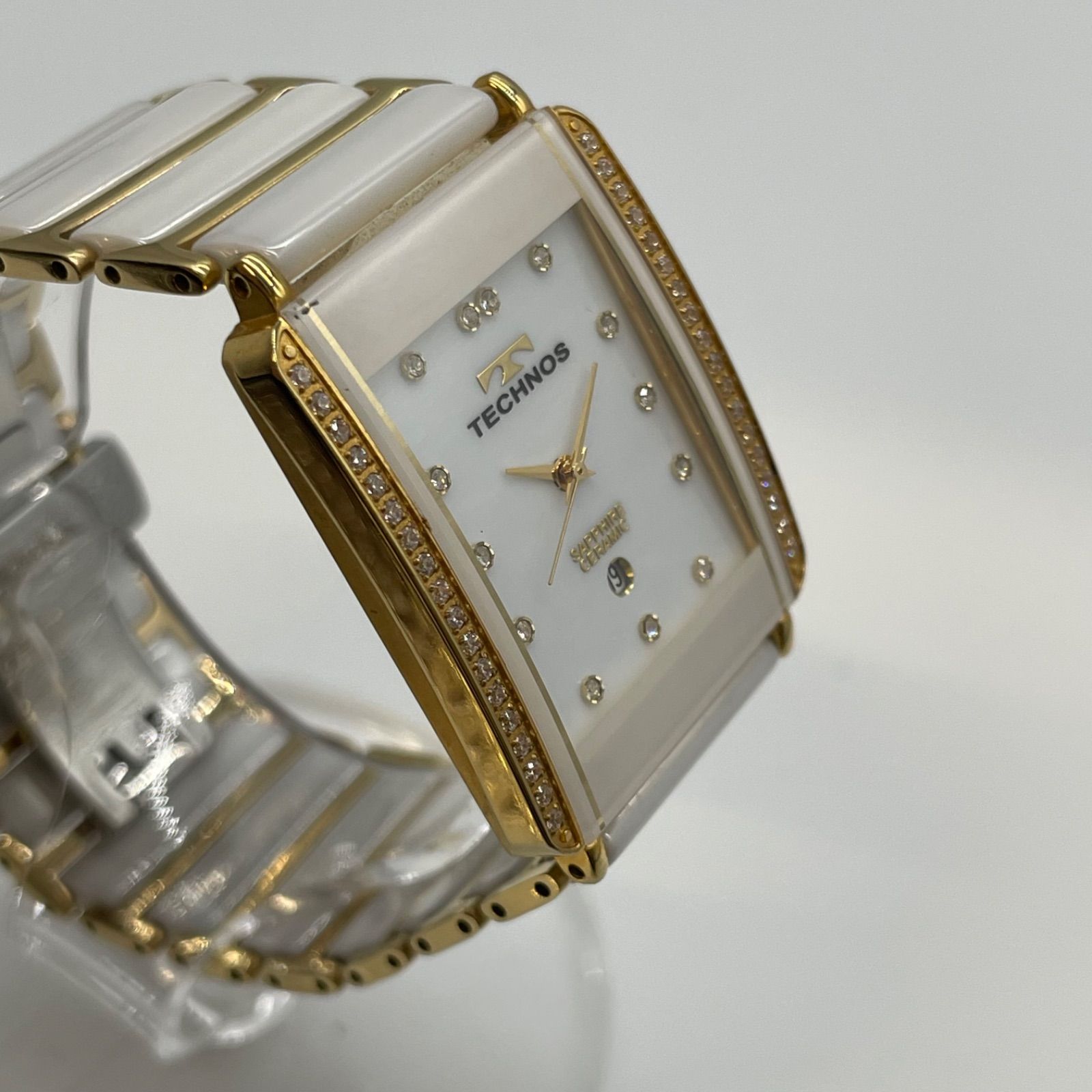 □TECHNOS テクノス T9557 クォーツ時計 13P セラミック 稼働品 A25 