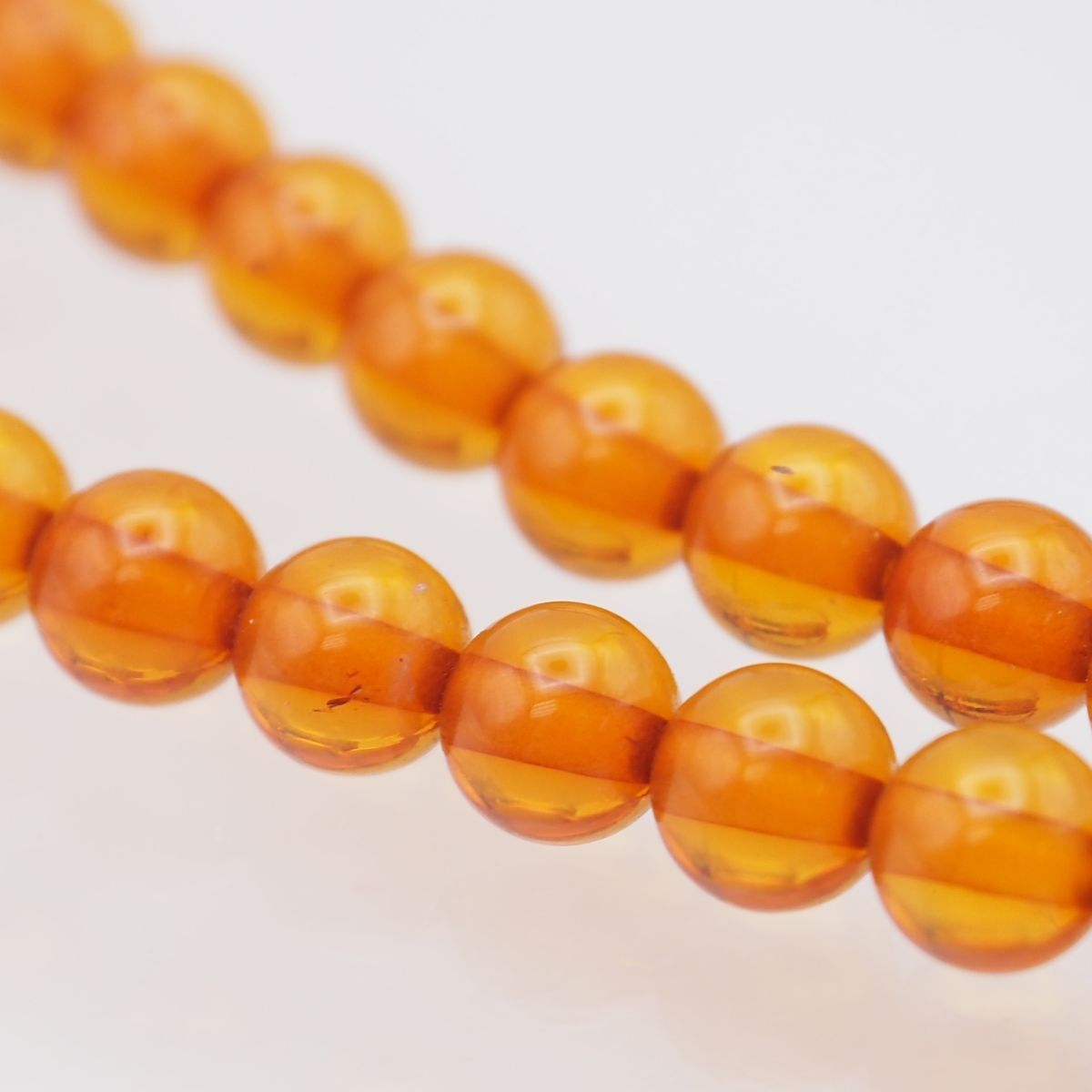 琥珀　インタリオ（裏彫り、かわせみ）のＫ１８ペンダント（小型、メキシコ産イエローアンバー） 還暦祝い 女性琥珀 ネックレス琥珀ペンダントK18　金プレゼントおしゃれインタリオかめ　レッドアンバー　赤琥珀　亀カメオ　 プレミアムアンバー　記念日贈物 | ジュエリーコタニ