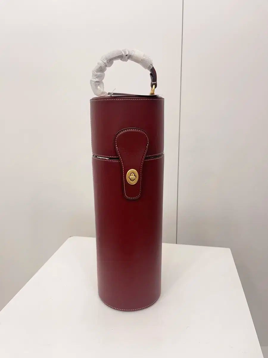 iPhone15Pro コーチ（R）ブックタイプケース / シグネチャーブラウン