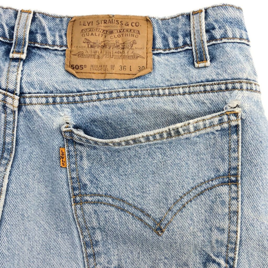 デニムパンツ オレンジタブ