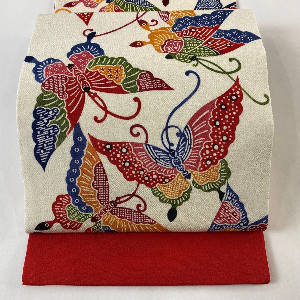 開き名古屋帯 名品 栗山吉三郎 落款 紅型 蝶 縮緬 クリーム 正絹