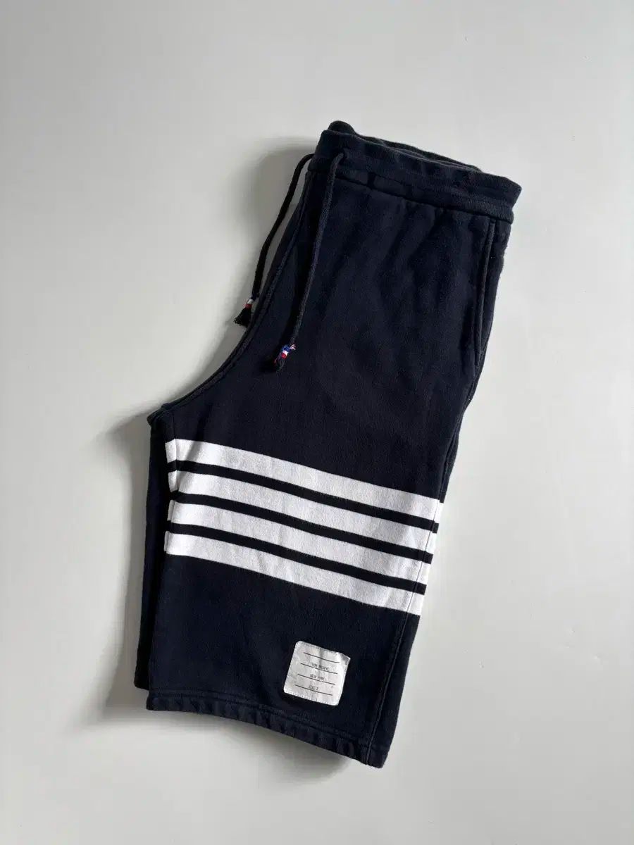 トム ブラウン ネイビー ハーフ パンツ