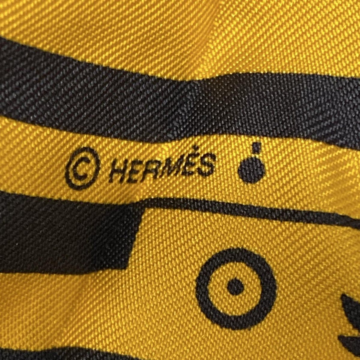 HERMES(エルメス) スカーフ美品 ツイリー グレー×黒×オレンジ リボン  