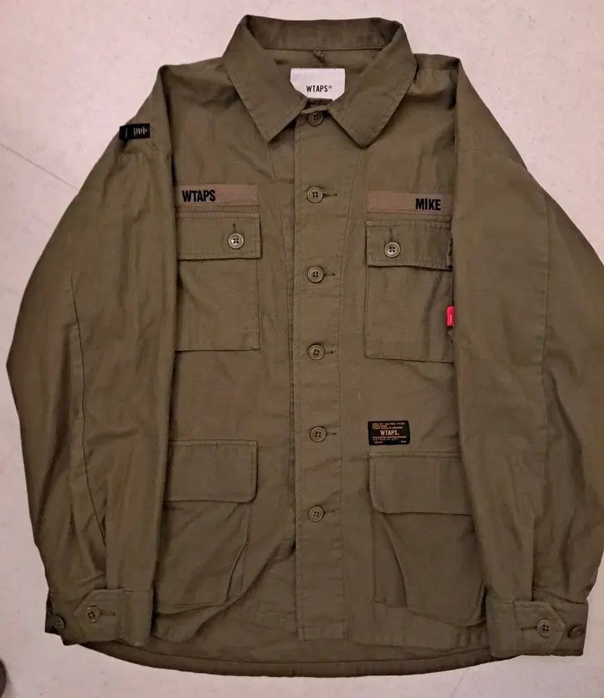 良品　WTAPS ダブルタップス　ジャングル ファティーグ シャツジャケット W)taps - ダブルタップス ジャングルファティーグ 長袖