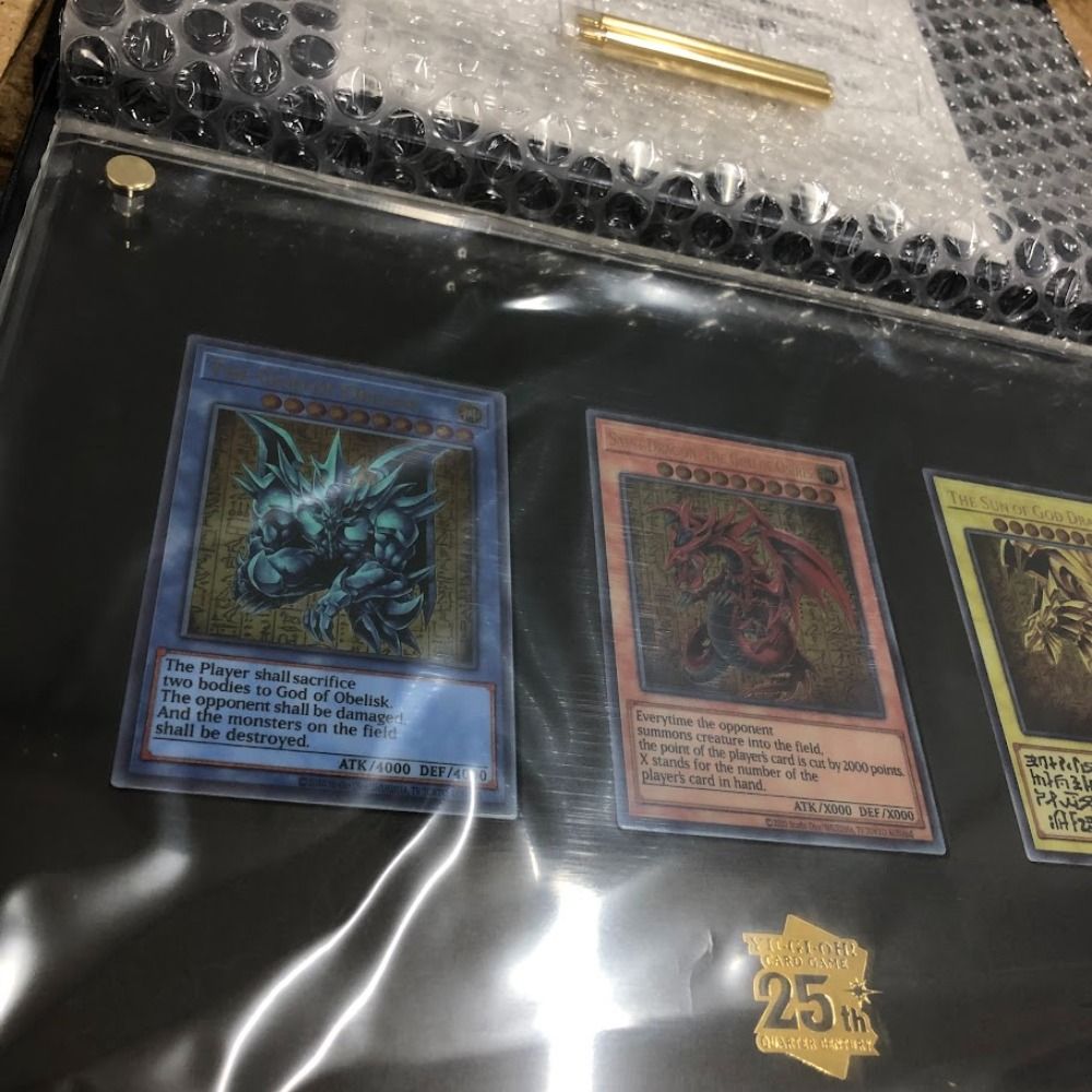 Amazon.co.jp: 遊戯王25周年記念商品 三幻神スペシャルカード
