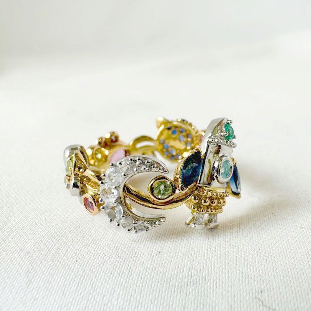 宇宙の旅リング K18 ダイヤ マルチカラーストーン - メルカリ 
