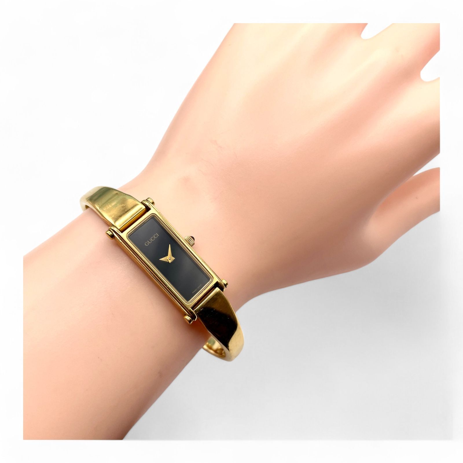 美品□稼働 GUCCI グッチ レディース 腕時計 1500 ゴールド 黒文字盤 